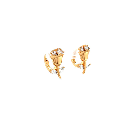 The Rose Flower Zirconia Stones and Petals Huggie Earrings in rose gold-filled design feature intricately detailed rose-shaped earrings adorned with small clear zirconia stones. Delicate stems and leaves enhance the floral elegance of these earrings, standing out beautifully against a plain white background.